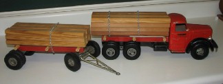 SMITH
        MILLER LUMBER TRUCK AND TRAILER.